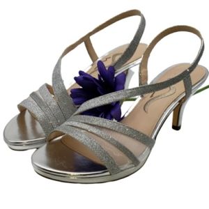 Brand New Nina silver 3 inch glitter heels. Super cute pair of shoes!